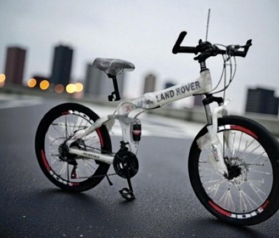 صورة دراجة رياضية بيضاء لاند روفر قابله للطي مقاس 26 و 24